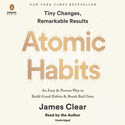 Book cover of ‘Atomic Habits’ by James Clear on a cream background with gold dotted typography.